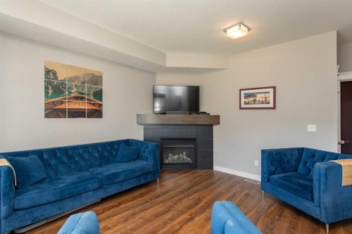 5324 44 Avenue, Red Deer, AB - Indoor Photo Showing Living Room With Fireplace