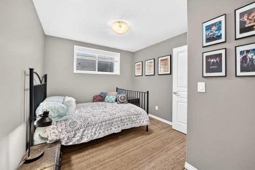 31 Crestview Boulevard, Sylvan Lake, AB - Indoor Photo Showing Bedroom