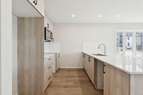 1201-350 Mahogany Parade Se, Calgary, AB - Indoor Photo Showing Kitchen