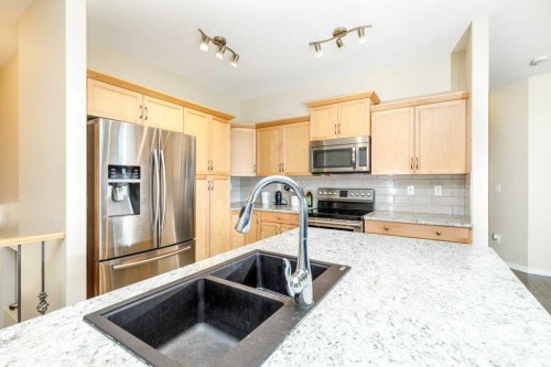 77 Alderwood Close, Blackfalds, AB - Indoor Photo Showing Kitchen With Double Sink