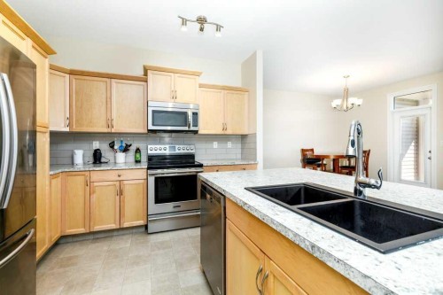 77 Alderwood Close, Blackfalds, AB - Indoor Photo Showing Kitchen With Double Sink