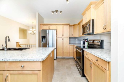 77 Alderwood Close, Blackfalds, AB - Indoor Photo Showing Kitchen With Double Sink