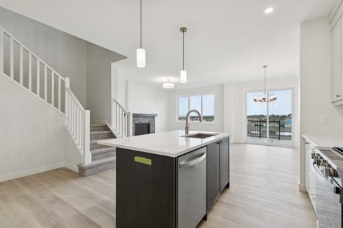 139 Fireside Close, Cochrane, AB - Indoor Photo Showing Kitchen With Upgraded Kitchen