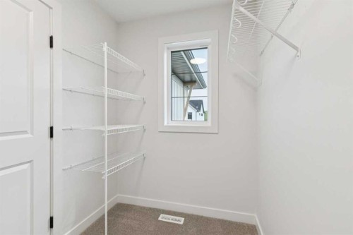 139 Fireside Close, Cochrane, AB - Indoor With Storage