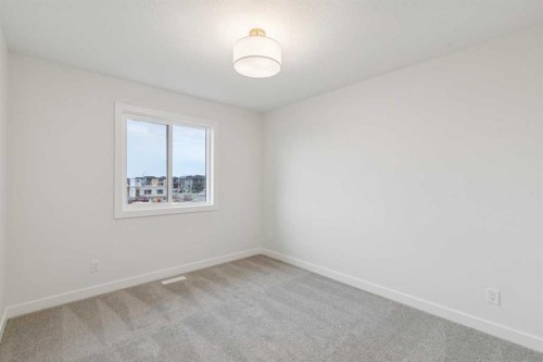 139 Fireside Close, Cochrane, AB - Indoor Photo Showing Other Room