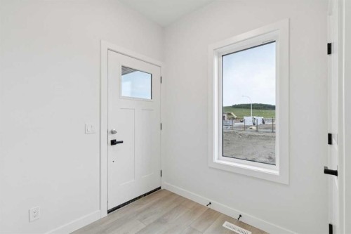 139 Fireside Close, Cochrane, AB - Indoor Photo Showing Other Room