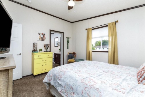 4705 45 Avenue, Alix, AB - Indoor Photo Showing Bedroom