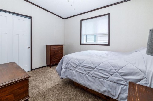 4705 45 Avenue, Alix, AB - Indoor Photo Showing Bedroom