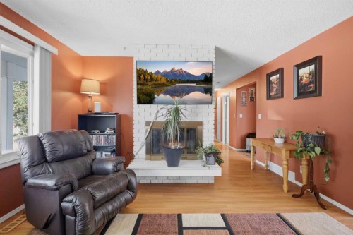 7 Halman Crescent, Red Deer, AB - Indoor Photo Showing Living Room With Fireplace