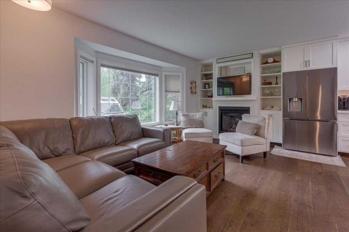 109 Selkirk Boulevard, Red Deer, AB - Indoor Photo Showing Living Room With Fireplace