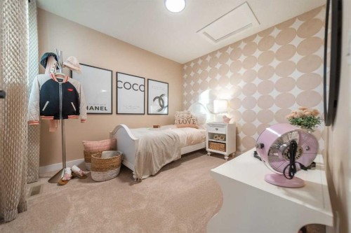 52 Southborough Common, Cochrane, AB - Indoor Photo Showing Bedroom