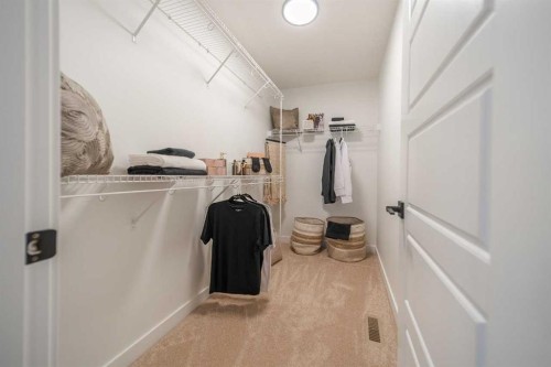 52 Southborough Common, Cochrane, AB - Indoor Photo Showing Other Room