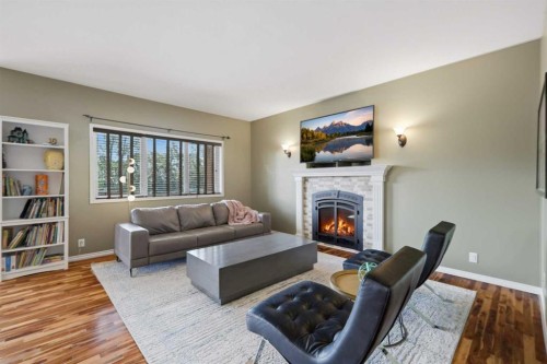 31 Kirton Close, Red Deer, AB - Indoor Photo Showing Living Room With Fireplace