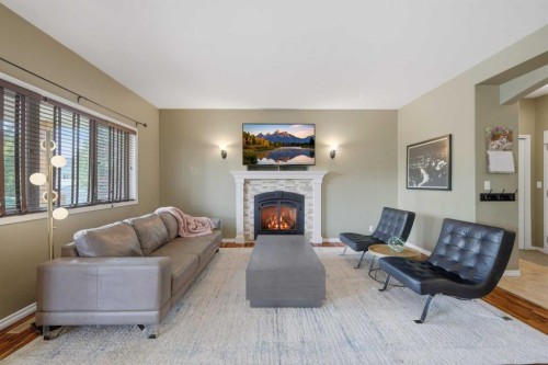 31 Kirton Close, Red Deer, AB - Indoor Photo Showing Living Room With Fireplace