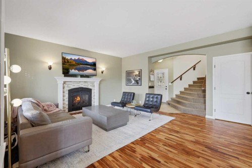 31 Kirton Close, Red Deer, AB - Indoor Photo Showing Living Room With Fireplace