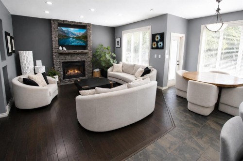 69 Vintage Close, Blackfalds, AB - Indoor Photo Showing Living Room With Fireplace