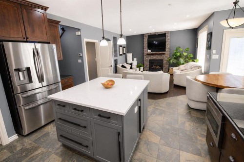 69 Vintage Close, Blackfalds, AB - Indoor With Fireplace