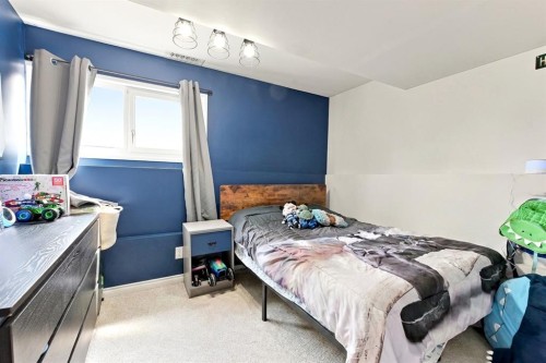 62 Rupert Crescent, Red Deer, AB - Indoor Photo Showing Bedroom