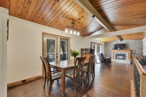9 Cronquist Close, Red Deer, AB - Indoor Photo Showing Dining Room With Fireplace