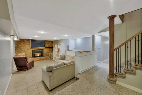 9 Cronquist Close, Red Deer, AB - Indoor With Fireplace