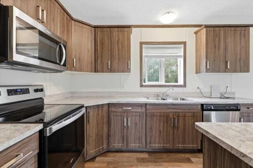1409 Twp Rd 502, Rural Leduc County, AB - Indoor Photo Showing Kitchen With Double Sink