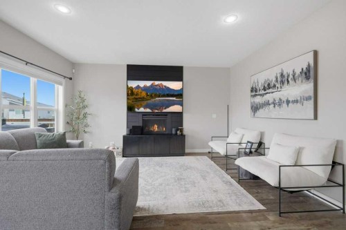 3 Craig Road, Sylvan Lake, AB - Indoor Photo Showing Living Room With Fireplace