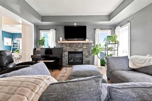 16 Viscount Drive, Red Deer, AB - Indoor Photo Showing Living Room With Fireplace