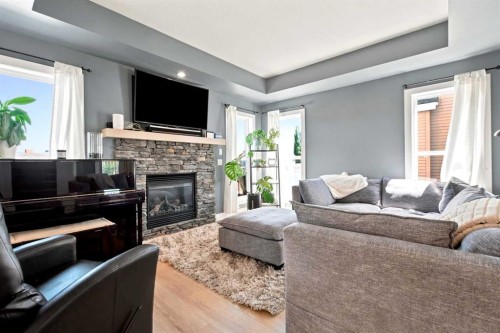 16 Viscount Drive, Red Deer, AB - Indoor Photo Showing Living Room With Fireplace