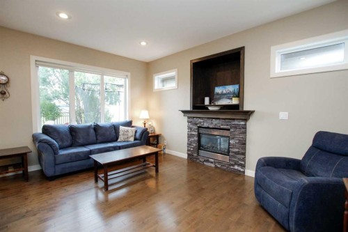 20 Connaught Crescent, Red Deer, AB - Indoor Photo Showing Living Room With Fireplace