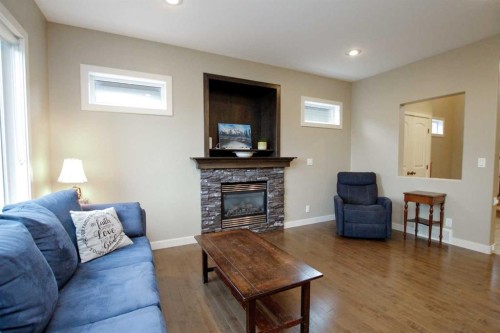 20 Connaught Crescent, Red Deer, AB - Indoor Photo Showing Living Room With Fireplace