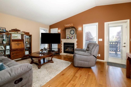 8 Innes Close, Red Deer, AB - Indoor Photo Showing Living Room With Fireplace