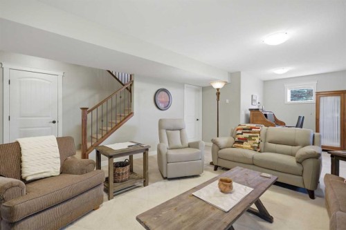 4006 38 Street, Ponoka, AB - Indoor Photo Showing Living Room With Fireplace