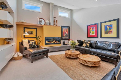 31 Leaside Crescent, Sylvan Lake, AB - Indoor Photo Showing Other Room With Fireplace