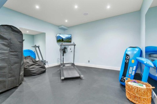 31 Leaside Crescent, Sylvan Lake, AB - Indoor Photo Showing Gym Room