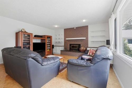 280 Barrett Drive, Red Deer, AB - Indoor Photo Showing Living Room With Fireplace