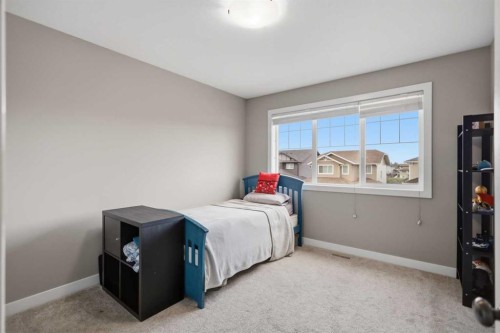64 Tanner Street, Red Deer, AB - Indoor Photo Showing Bedroom