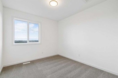 69 Bluerock Hill Sw, Calgary, AB 