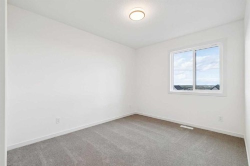 69 Bluerock Hill Sw, Calgary, AB 