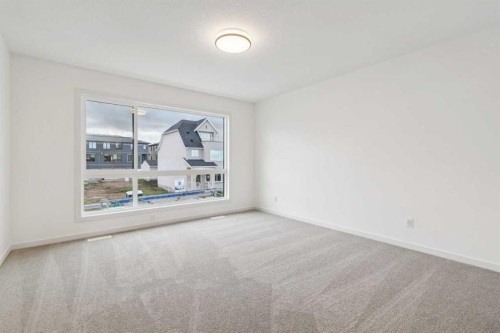 69 Bluerock Hill Sw, Calgary, AB 
