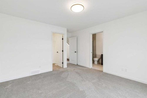 69 Bluerock Hill Sw, Calgary, AB 