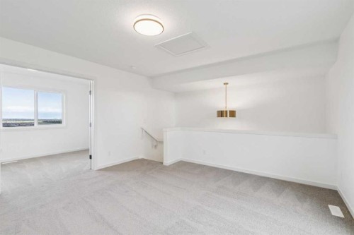 69 Bluerock Hill Sw, Calgary, AB 