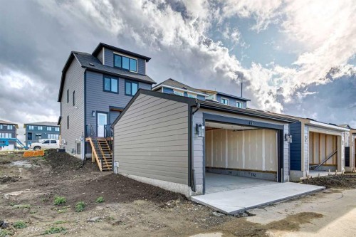 69 Bluerock Hill Sw, Calgary, AB 