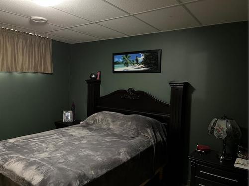 222 5Th Avenue, Burdett, AB - Indoor Photo Showing Bedroom