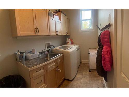 560 7A Avenue West, Cardston, AB - Indoor Photo Showing Laundry Room
