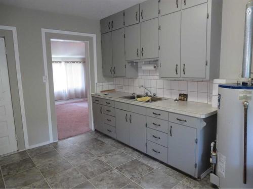 561 1St Street, Cardston, AB - Indoor Photo Showing Kitchen With Double Sink