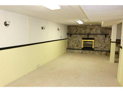 639 Maple Drive, Picture Butte, AB - Indoor With Fireplace