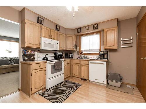 518 12 Street South, Lethbridge, AB - Indoor Photo Showing Kitchen With Double Sink
