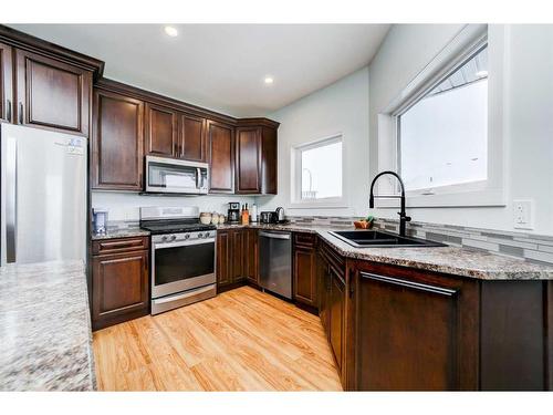 30 Prairie Lake Drive, Taber, AB - Indoor Photo Showing Kitchen With Double Sink