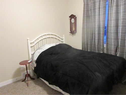 217 Sundance Drive, Coalhurst, AB - Indoor Photo Showing Bedroom