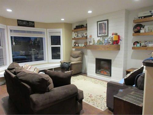 217 Sundance Drive, Coalhurst, AB - Indoor Photo Showing Living Room With Fireplace